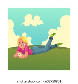 Young woman playing with smartphone on the grass, using mobile phone, lying on her stomach, cartoon vector illustration isolated on white background. Woman, girl in jeans and t-shirt lying with phone