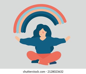 Young woman practices yoga and open her arms to the rainbow. Happy girl sits in lotus pose and creates positive vibe around her. Female enjoys her life. Freedom, well being, mental health care concept