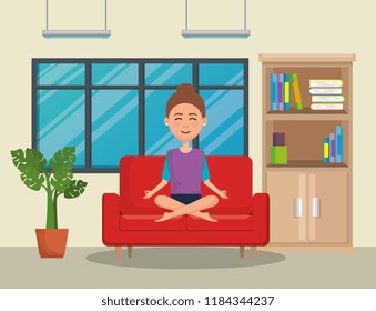 young woman practicing yoga in the sofa