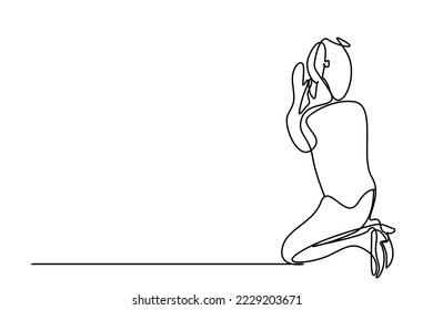 young woman praying on her knees apologizing
