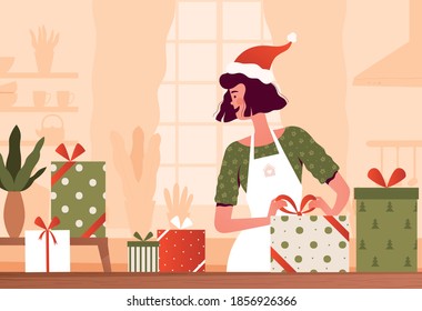 Young woman is preparing for Christmas and packing gifts for the family.