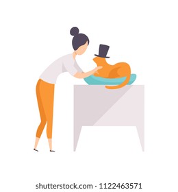 Young woman presenting her purebred cat in black top hat at cat breeds show vector Illustration on a white background