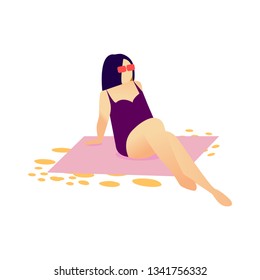 
Young woman in purple swimsuit and sunglasses sunbathes