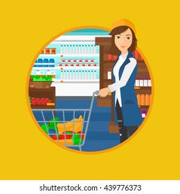 Young woman pushing a supermarket cart with some goods in it. Customer shopping at supermarket with cart full with groceries. Vector flat design illustration in the circle isolated on background.