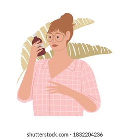 Young woman reading ingredients of organic natural cosmetic product