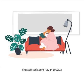 A young woman reads a book while sitting under a blanket on a red sofa in the apartment. Flat vector illustration