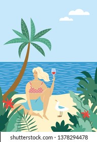 young woman relaxes and drinks wine on the beach, near seagull , tropical plants around