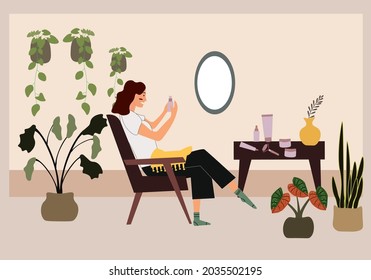 Young woman resting in comfy armchair with skincare.Happy female character relaxing and  reading skincare instructions at home. Colored flat vector illustration.