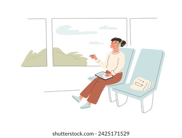 Young woman is riding a train at the window, listening to music with headphones and holding a tablet with pencil in her hands. The girl is happy and thoughtful. A student is going to study. 