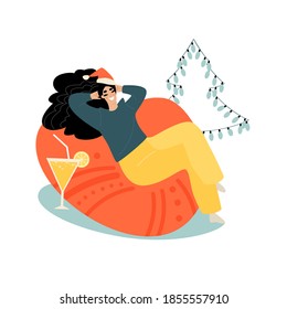 Young woman in a santa hat sitting in a comfortable armchair with a glass of sparkling wine. Cartoon image in flat style