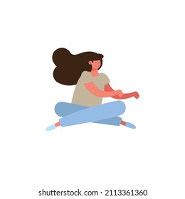 young woman seated in the floor