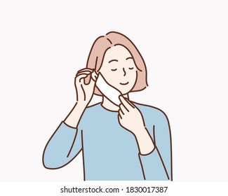 Young woman showing how to wear a medical mask step by step. Hand drawn style vector design illustrations.