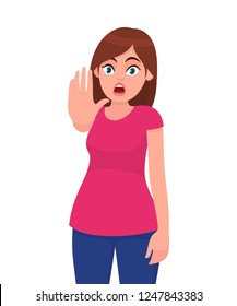 Young woman showing stop gesture 
sign with palm of the hand. Young girl requiring stop with her hand. Prohibition symbol. Emotion and body language concept illustration in vector cartoon flat style.