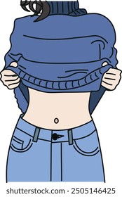 Mujer joven muestra su barriga plana después de perder peso en pantalones vaqueros azules