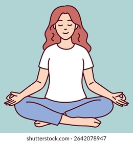 Young woman sits cross-legged in lotus pose with eyes closed, focusing on mindfulness and inner peace through yoga meditation practice