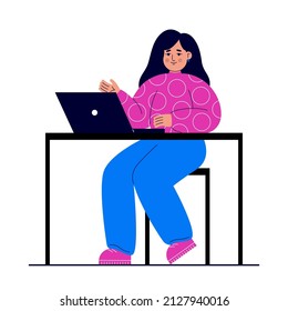 Young woman sits at a table with a laptop. Distance learning concept, e-learning, remote work from home, freelance, courses. Student learns using a computer.