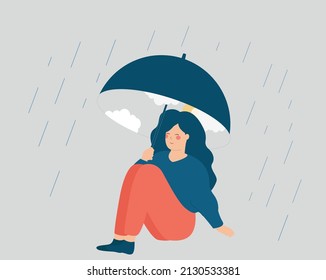 Young woman sits under an umbrella and looks happy. Girl in good mood because of weather emits positive vibes. Concept of well-being, positive body, self love concept, inner peace and mental health.