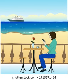 young woman sitting in a cafe by the sea with a phone