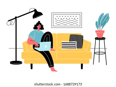 Young woman is sitting with laptop on comfy sofa. Freelance, online education, social media concept. Quarantine, self-isolation. 