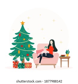 Young Woman Sitting on an Armchair with her Cat and Holding Coffee Mug next to Christmas Tree and Gifts Flat Vector Illustration.