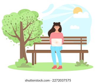 Young woman sitting on the bench in the park and working with laptop. Freelance, working, studying, education, work from home, healthy lifestyle concept. 