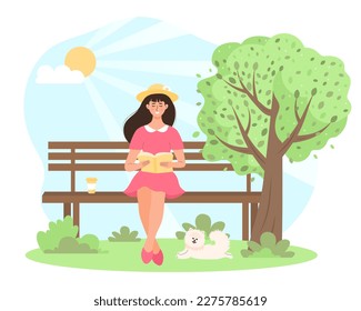 Young woman sitting on the bench in the park and reading a book. Cute dog resting nearby. Freelance, working, studying, education, dog walking, healthy lifestyle, hobby, relax concept.