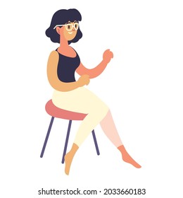 young woman sitting on chair, isolated