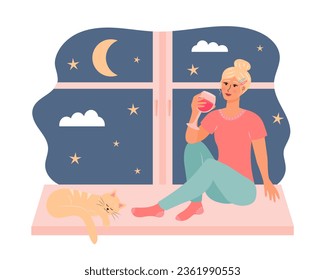 Young woman sitting on the window with a glass of wine and cute cat sleeping near her. Stars and moon outside the window. 