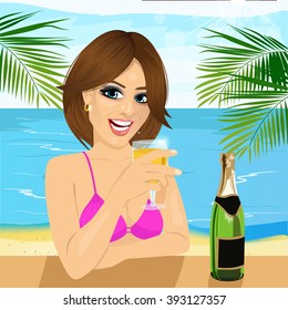 young woman sitting at table at the beach drinking glass of champagne 
