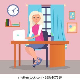 Young woman sitting at table and using laptop. Quarantine distance work. Freelance work at home. Effectively organizing home time. Home office. Businesswoman or student working at home or office