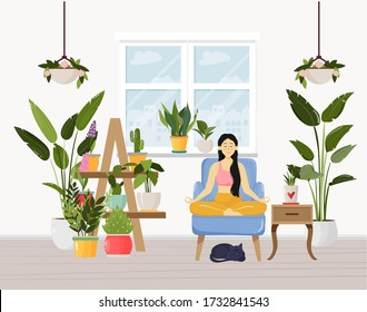 Young woman sitting in yoga lotus pose and meditating. Meditation practice at home with cute cat. Vector illustration. Urban jungle concept, room full of green potted plants