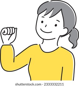 A young woman smiling with a guts pose