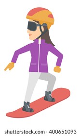 Young woman snowboarding.
