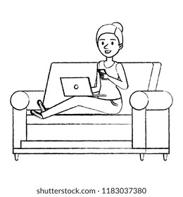 young woman at sofa with laptop and smartphone
