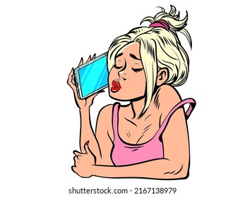 A young woman speaks on the phone. Smartphone in hand. Modern gadgets, mobile communication, internet