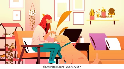 young woman spending time with dog female owner and cute domestic animal friendship with pet concept