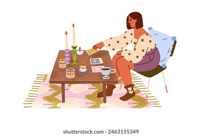 Mujer joven que extiende y que lee las tarjetas del tarot en casa acogedora. Chica moderna sentada en una mesa de centro con cubierta de taro, velas enormes. Hobby esotérico, ocio. Ilustración vectorial plana aislada en blanco