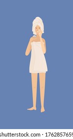 Young woman standing and holding cream in her hand and moisturizing her skin. Cute girl wearing towel. Everyday skincare routine. Flat vector female character.  Isolated on blue background.