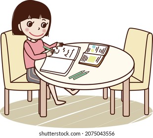 Young woman studying at table.