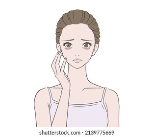 A young woman suffering from dark circles under her eyes