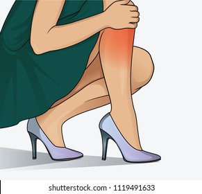 Young woman suffering from legs pain because of uncomfortable shoes, high heels.