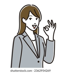 A young woman in a suit giving an okay sign