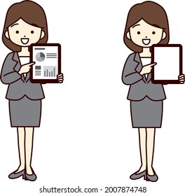 Young woman in a suit showing a tablet with a smile. There is copy space on the tablet screen.