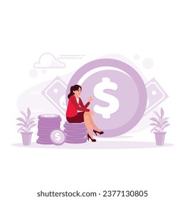 A young woman in a suit was sitting on a pile of coins. One large coin is next to it in the background. Earning Money concept. Trend Modern vector flat illustration