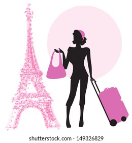  young  woman with suitcase in Paris