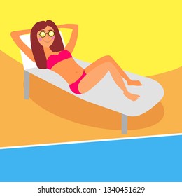 Young woman sunbathing on a beach. Girl relaxing on a lounger under parasol on a tropical beach with ice cream, beach-bag, sunglasses and bottle of water.