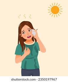 Young woman sweating under very hot sunny day