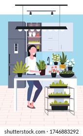young woman taking care of houseplants girl enjoying her ecology hobby stay home lifestyle concept kitchen interior vertical full length vector illustration