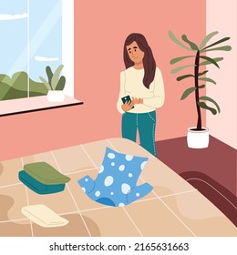 Young woman taking photo of t-shirt using her smartphone on the bed. Online sale, reuse, conscious consumer concept. Color flat cartoon vector illustration