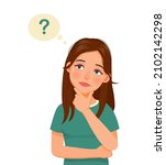 young woman thinking looking up while touching her chin to find solution of problems